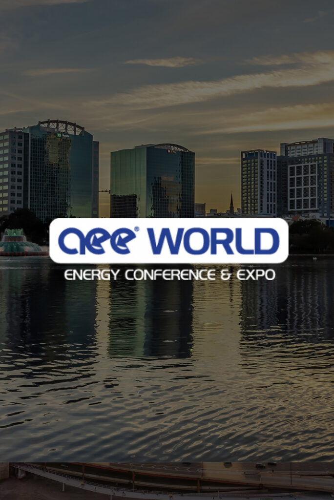 City skyline at sunset over water with a large 'World Energy Conference & Expo' logo banner across the foreground.